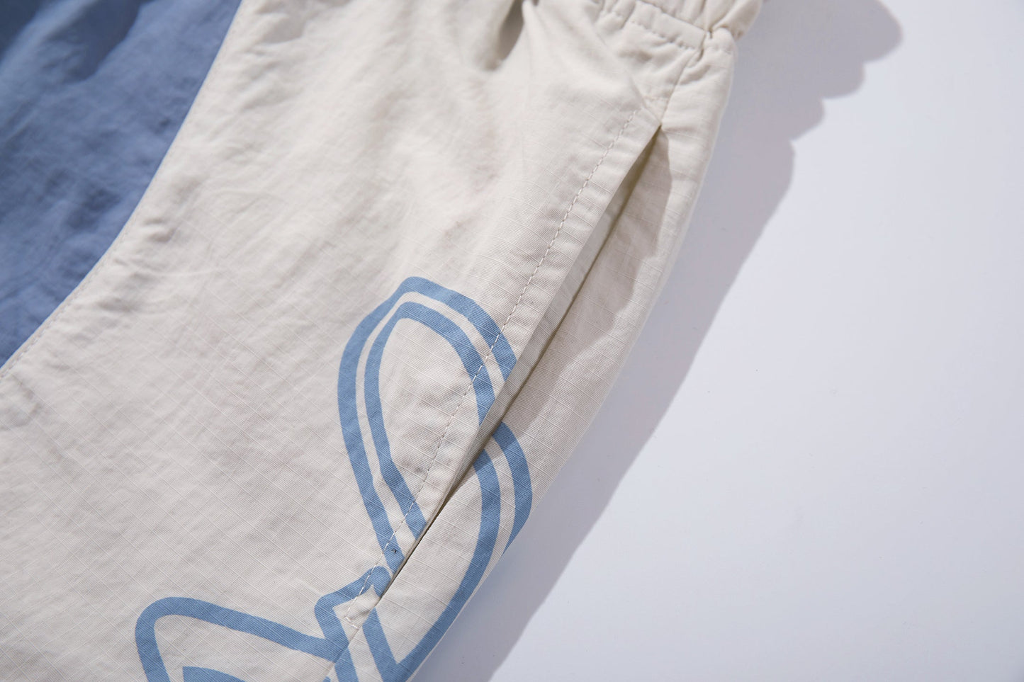 CapCabin Graphic Panel Track Pants