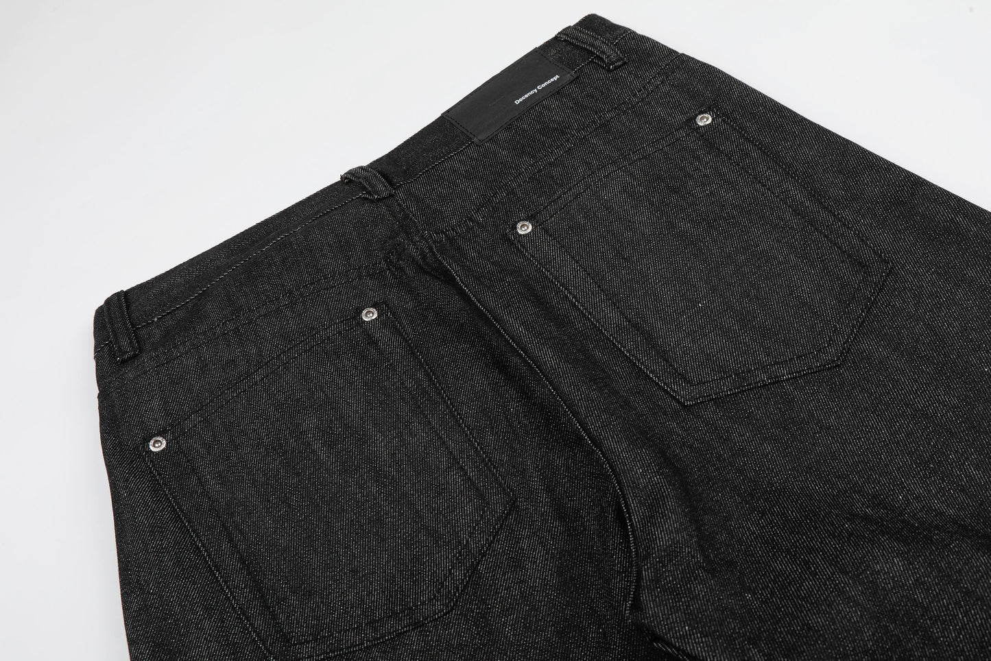 CapCabin “Black Raw Button Denim Jeans”