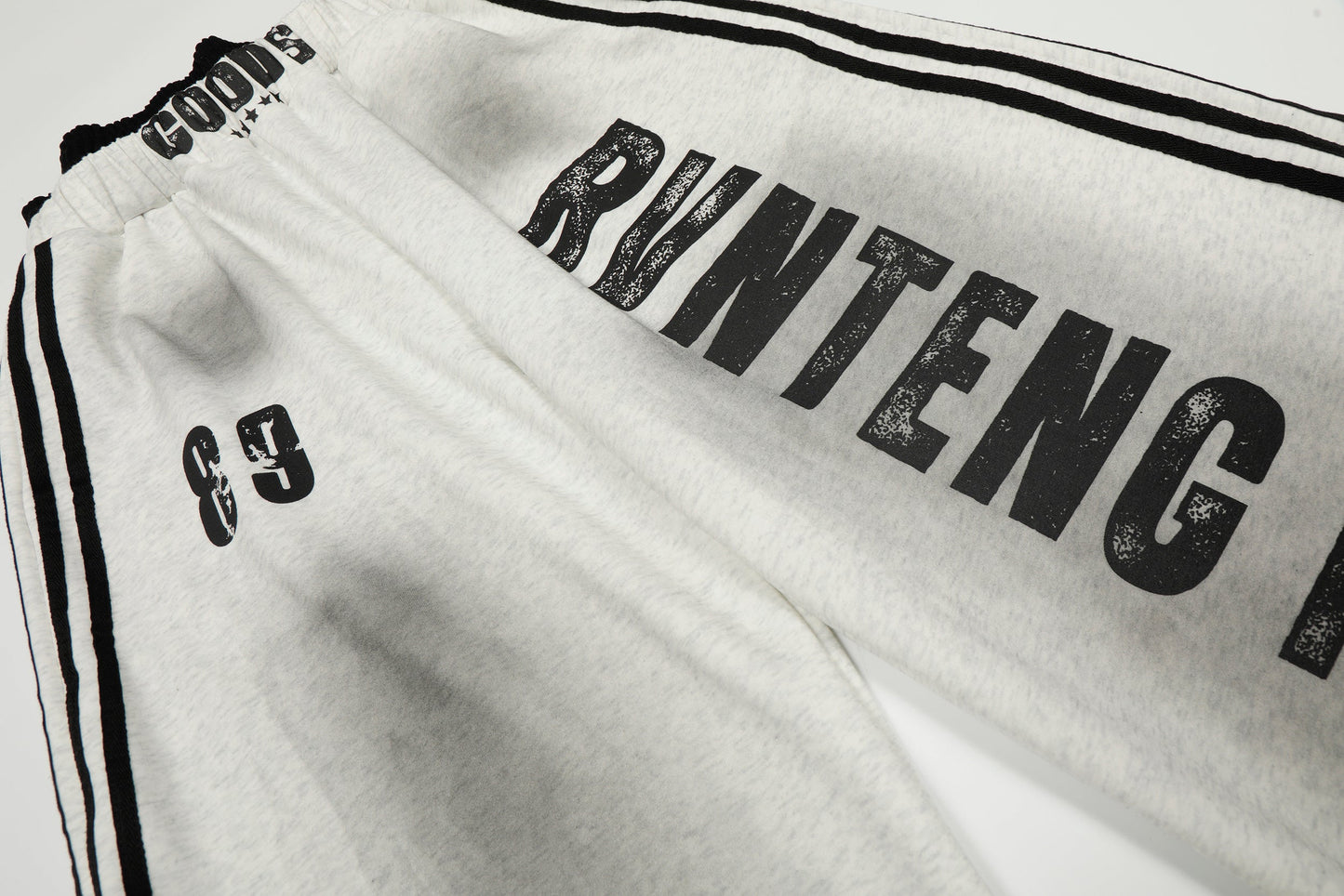 CapCabin Bold Letter Stripe Track Pants