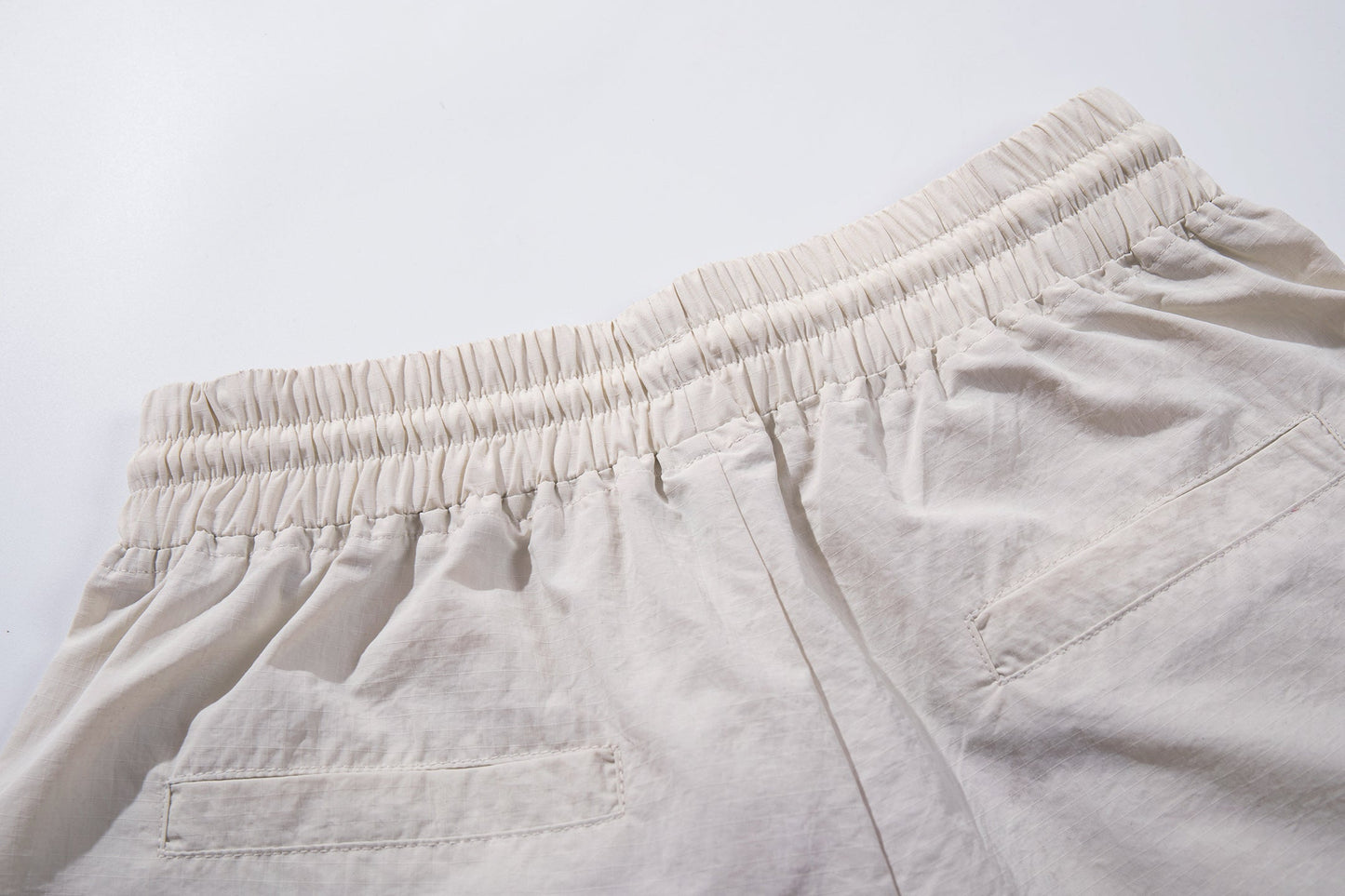 CapCabin Cross Graphic Wide-Leg Track Pants
