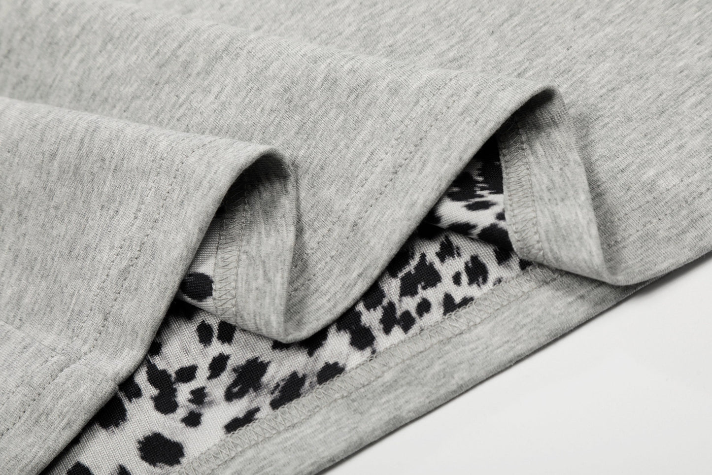 CapCabin “Leopard Trim Zip Polo”