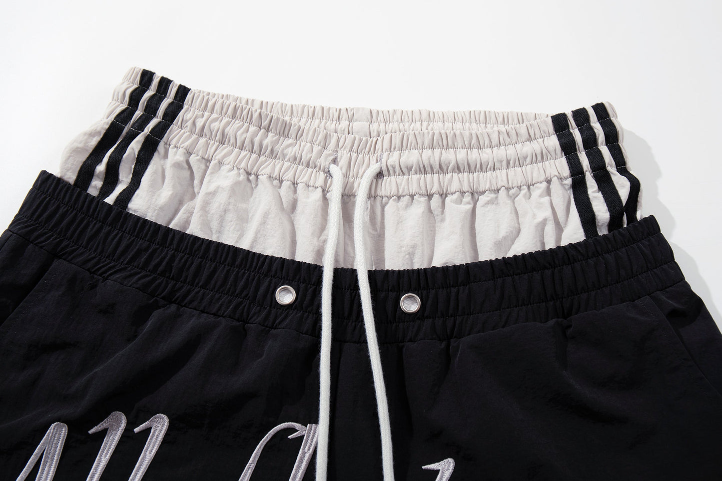 CapCabin Script Graphic Wide-Leg Track Pants