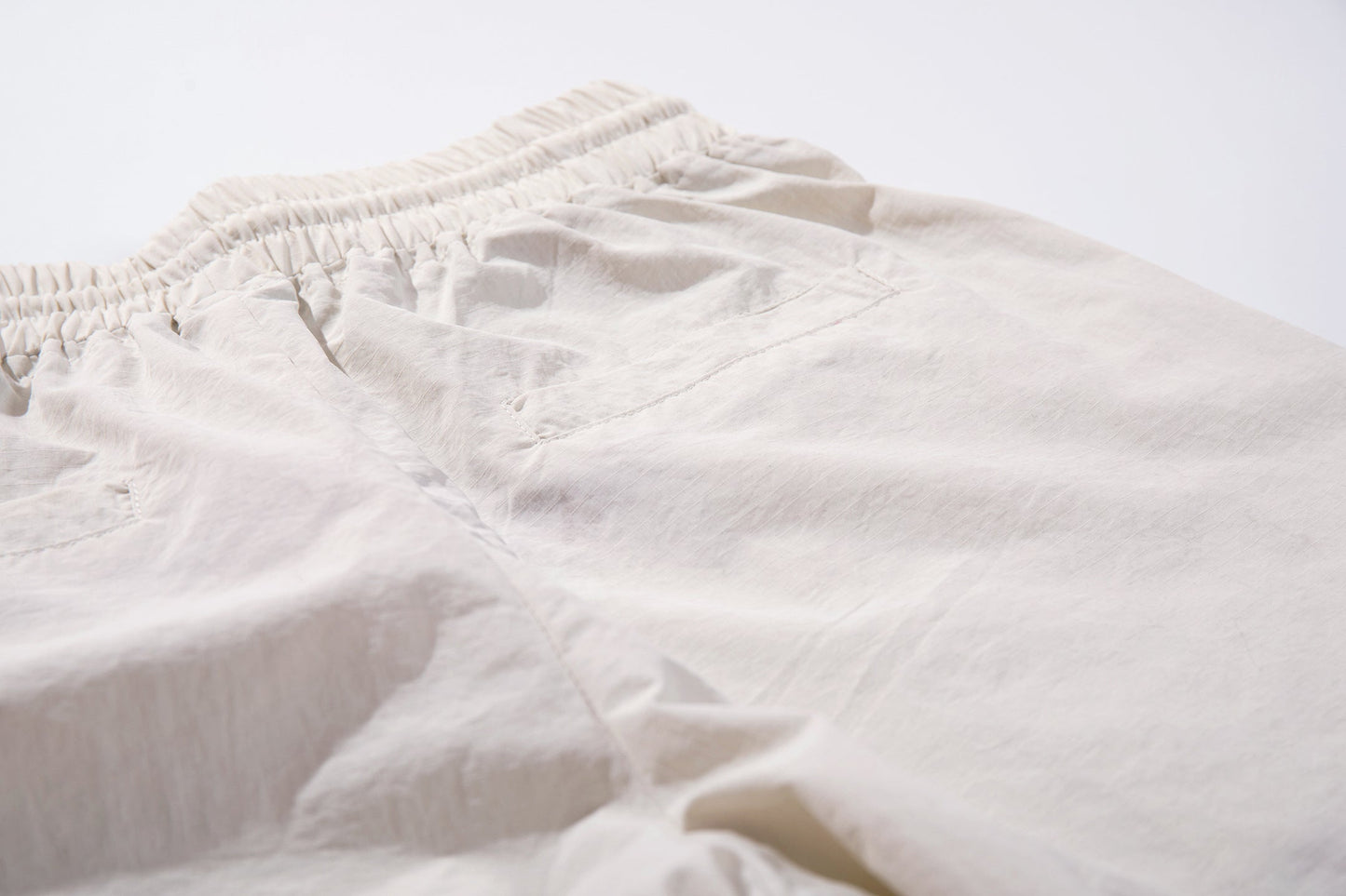 CapCabin Cross Graphic Wide-Leg Track Pants