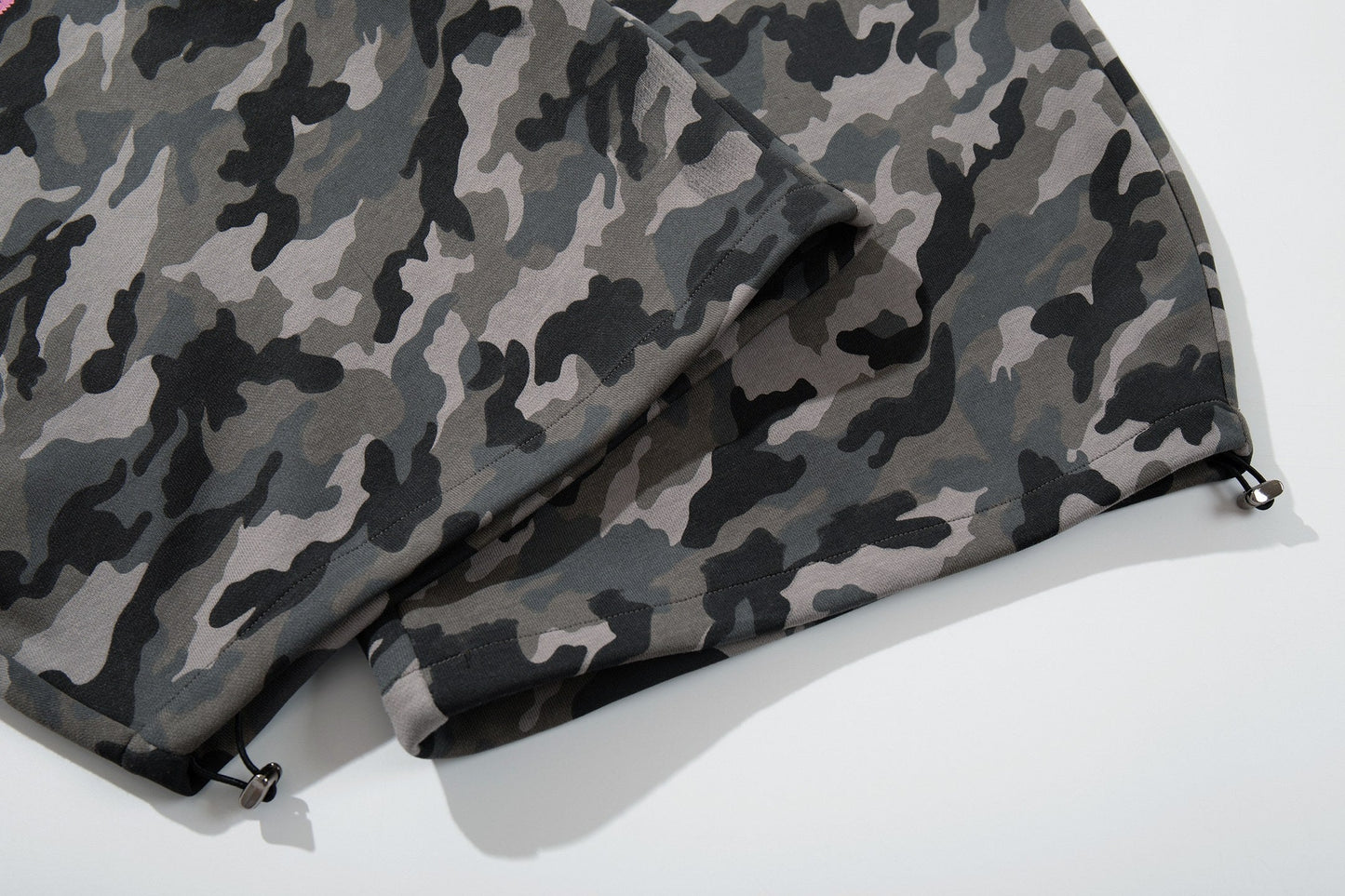 CapCabin “Camo Graffiti Wide-Leg Pants”