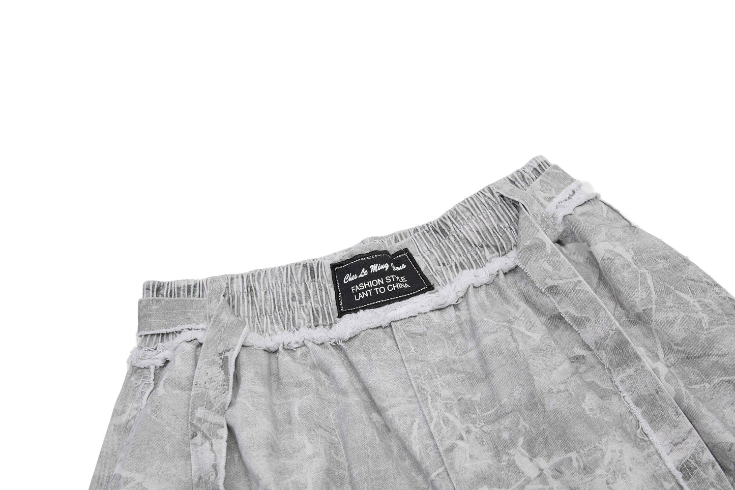 CapCabin “Washed Marble Wide-Leg Pants”