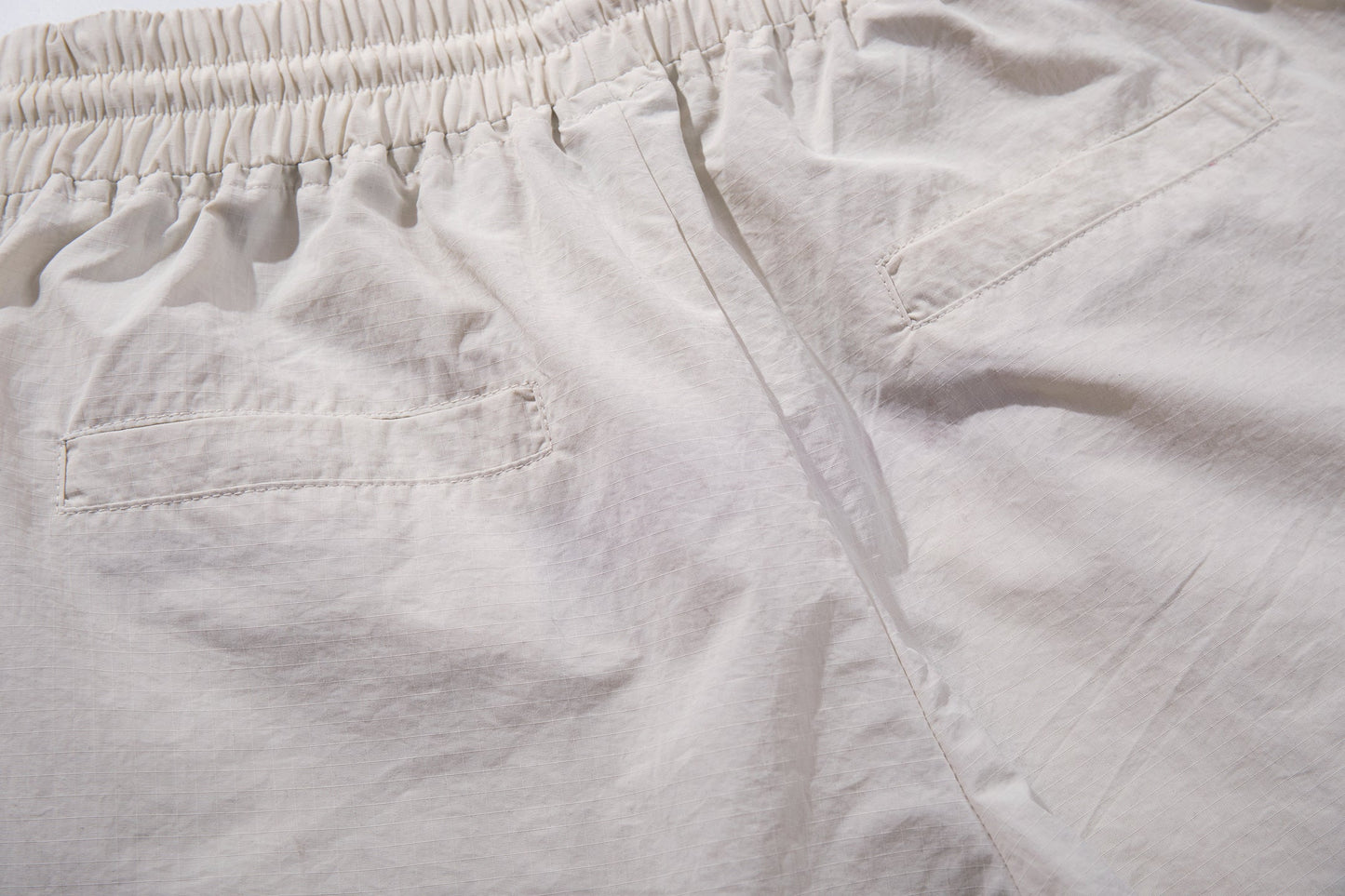 CapCabin Cross Graphic Wide-Leg Track Pants