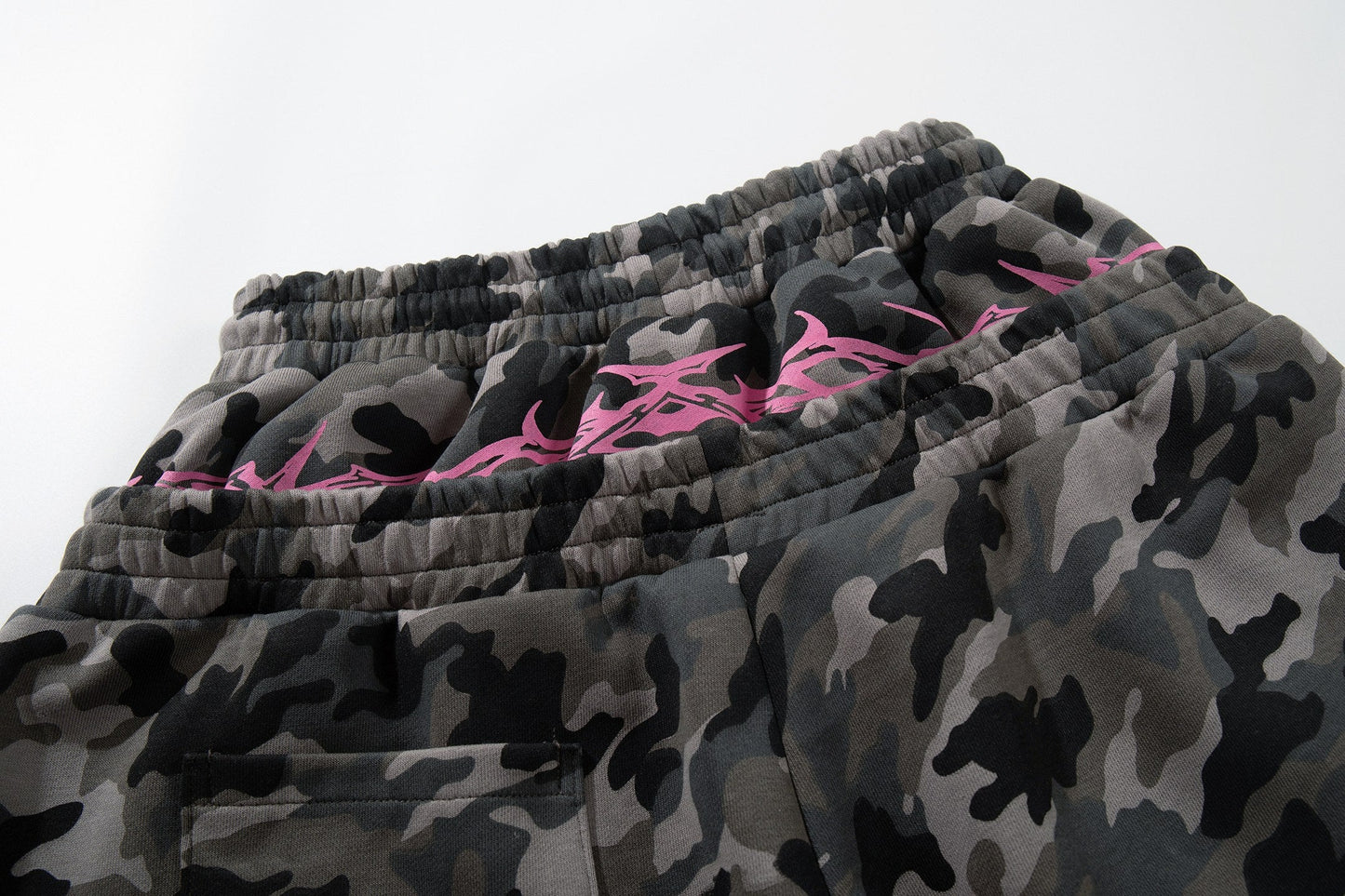 CapCabin “Camo Graffiti Wide-Leg Pants”