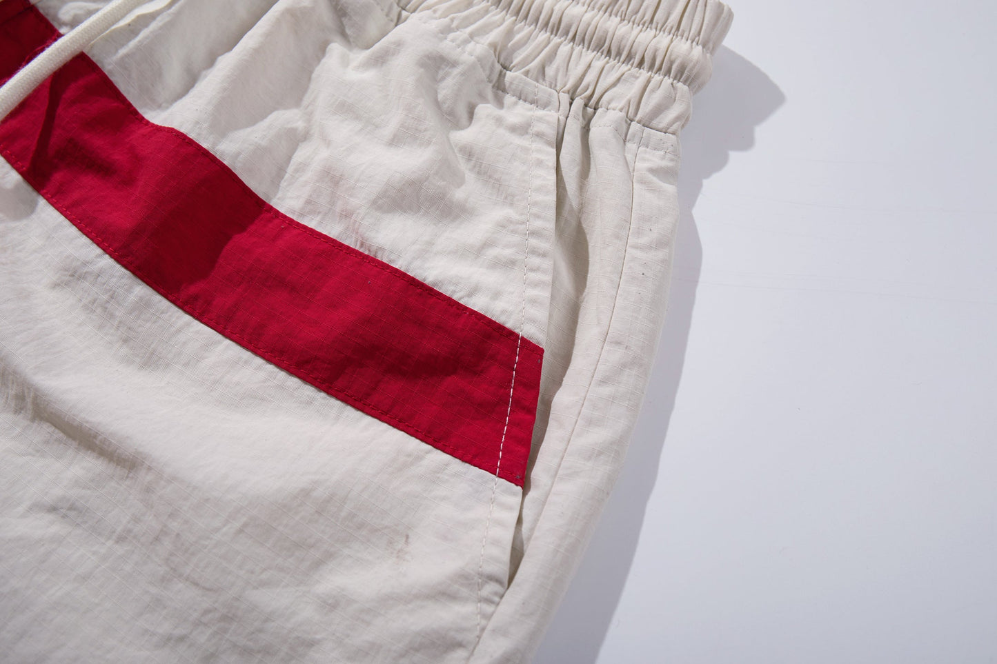 CapCabin Cross Graphic Wide-Leg Track Pants