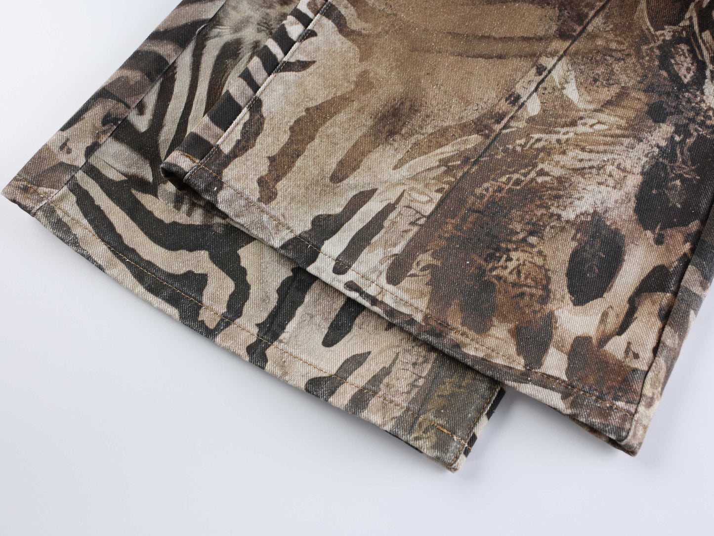 CapCabin “Savage Pattern Balloon Jeans”