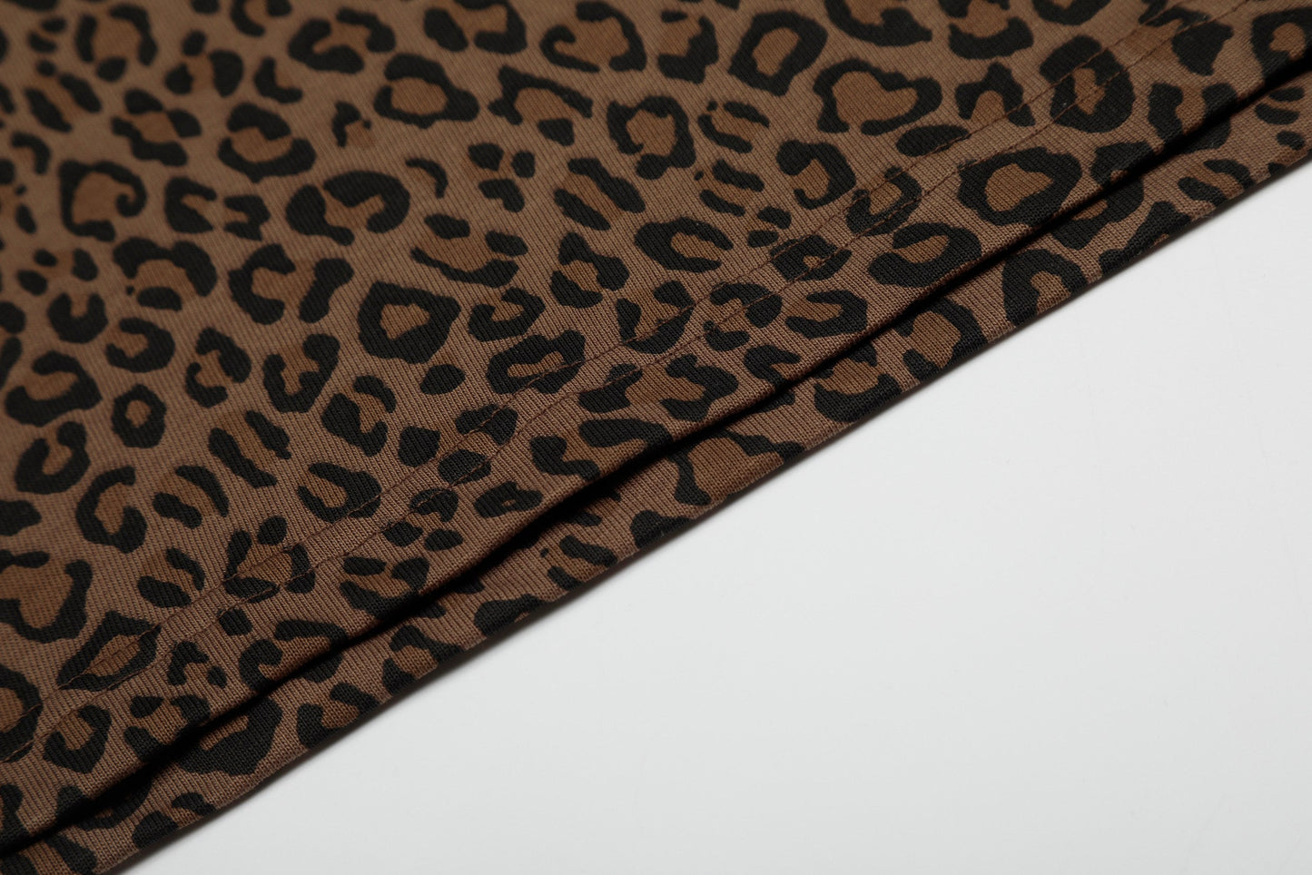 CapCabin “Leopard Script Polo Tee”