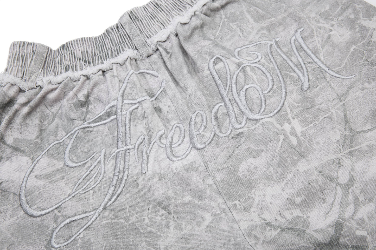 CapCabin “Washed Marble Wide-Leg Pants”