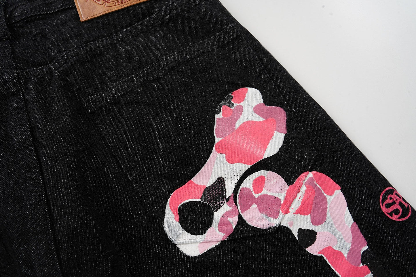 CapCabin Skeleton Graphic Wide-Leg Denim Pants