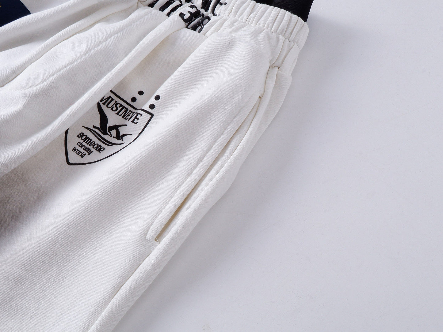 CapCabin “Distressed Sport Wide-Leg Pants”
