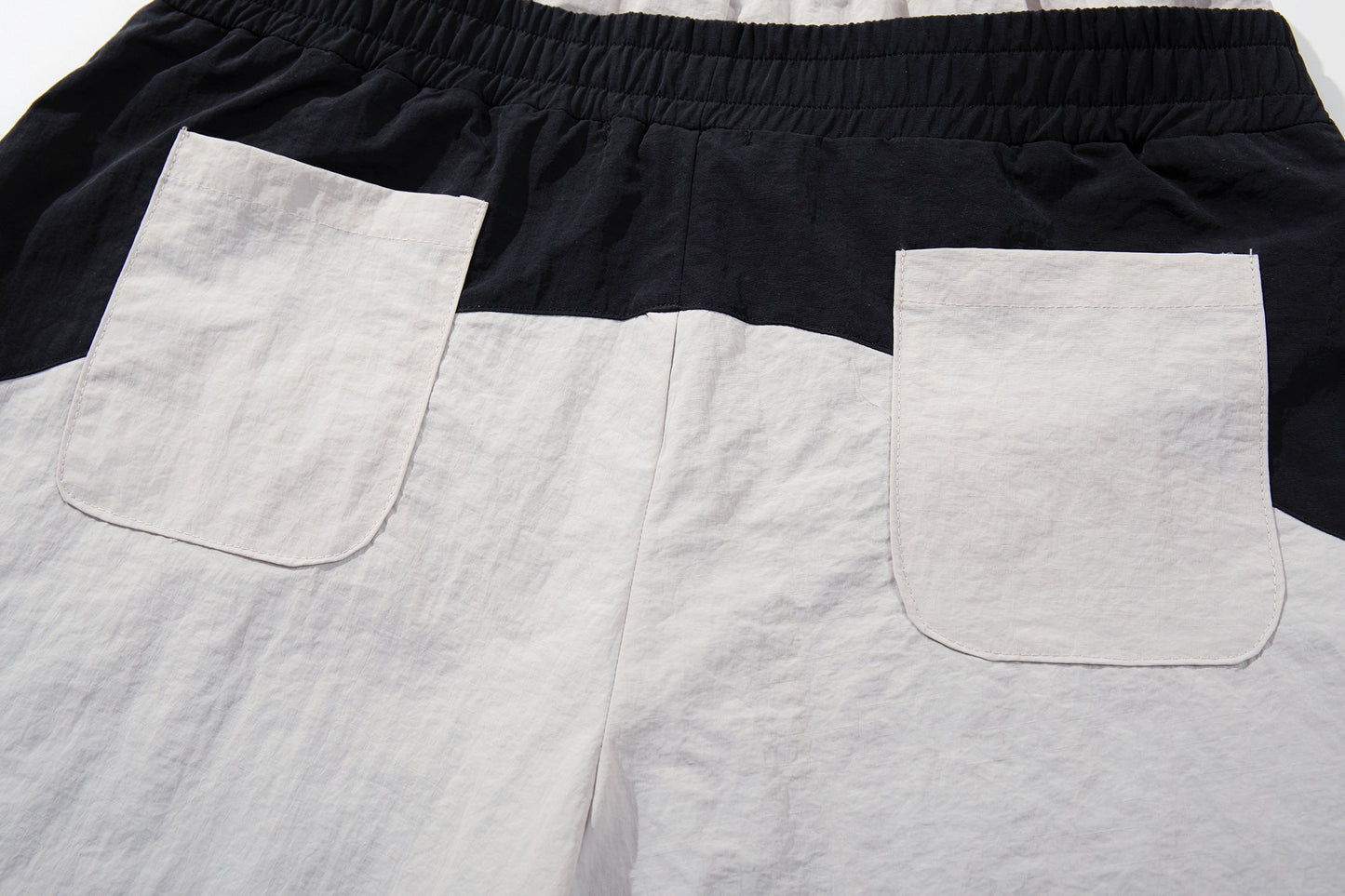 CapCabin Script Graphic Wide-Leg Track Pants
