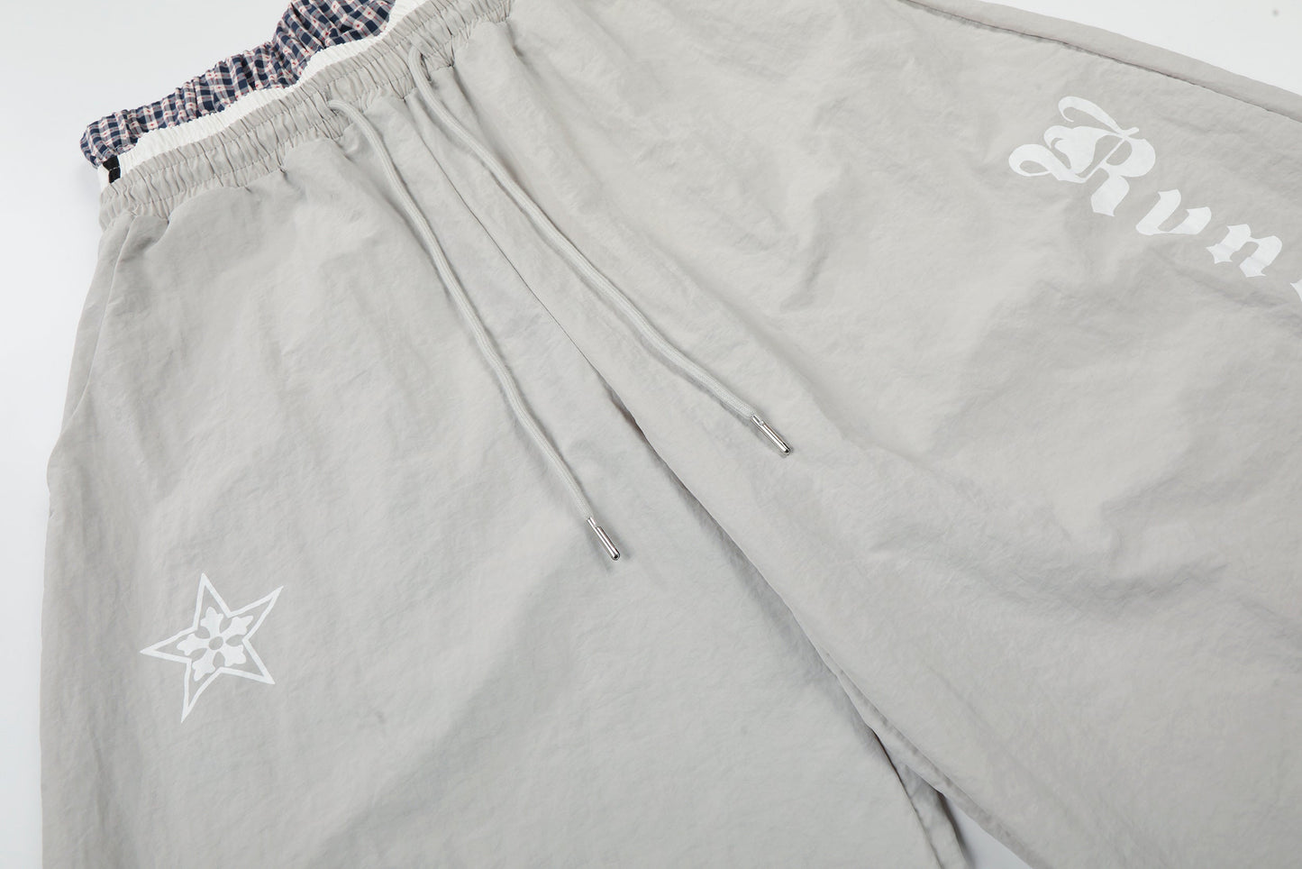 CapCabin Script Logo Wide-Leg Nylon Pants