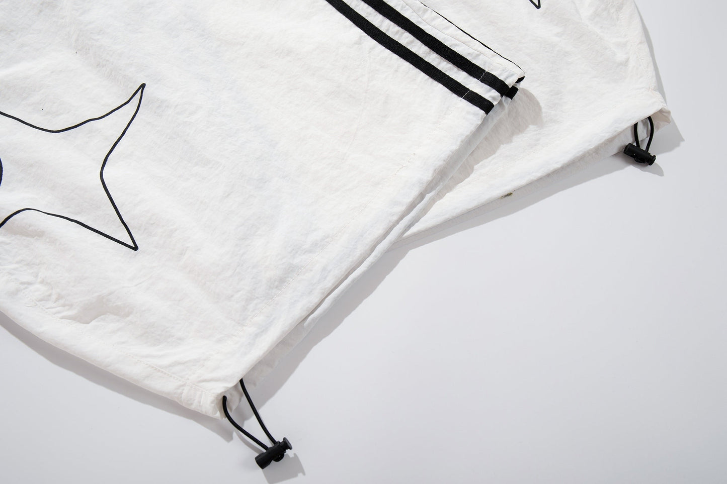 CapCabin “Starline Wide-Leg Track Pants”