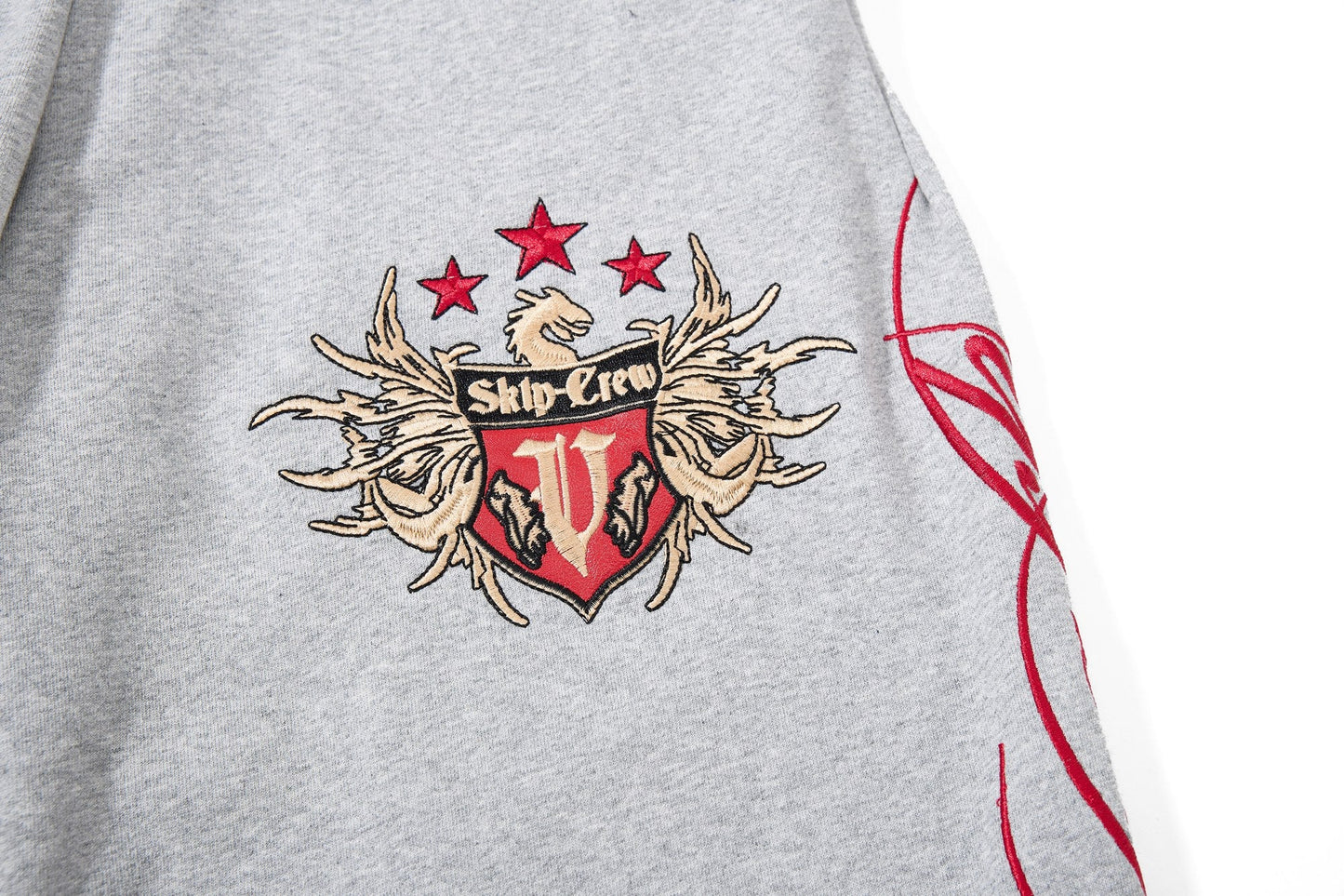 CapCabin “Varsity Crest Wide-Leg Sweatpants”