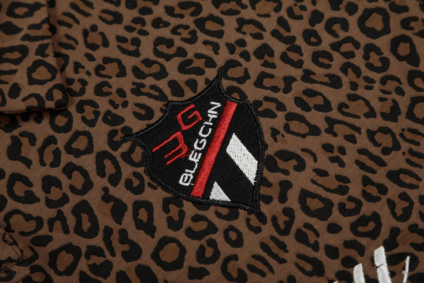 CapCabin “Leopard Script Polo Tee”