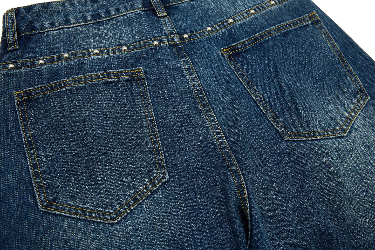 CapCabin “Studded Panel Denim Jeans”
