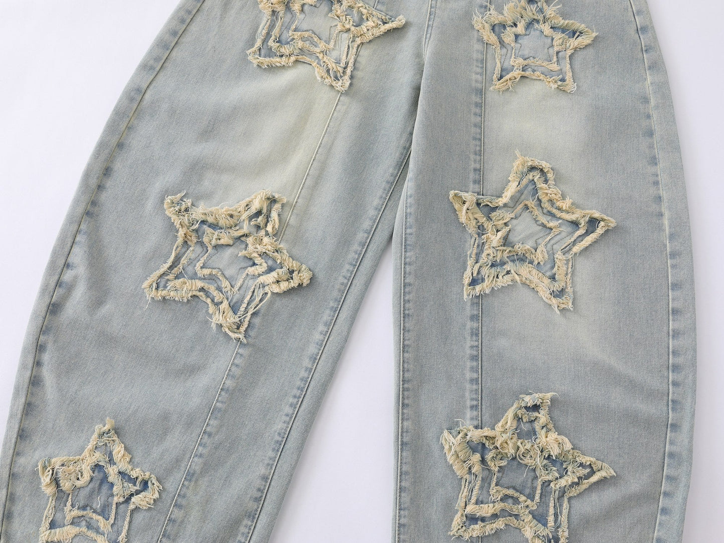 CapCabin “Star Distressed Wide-Leg Jeans”