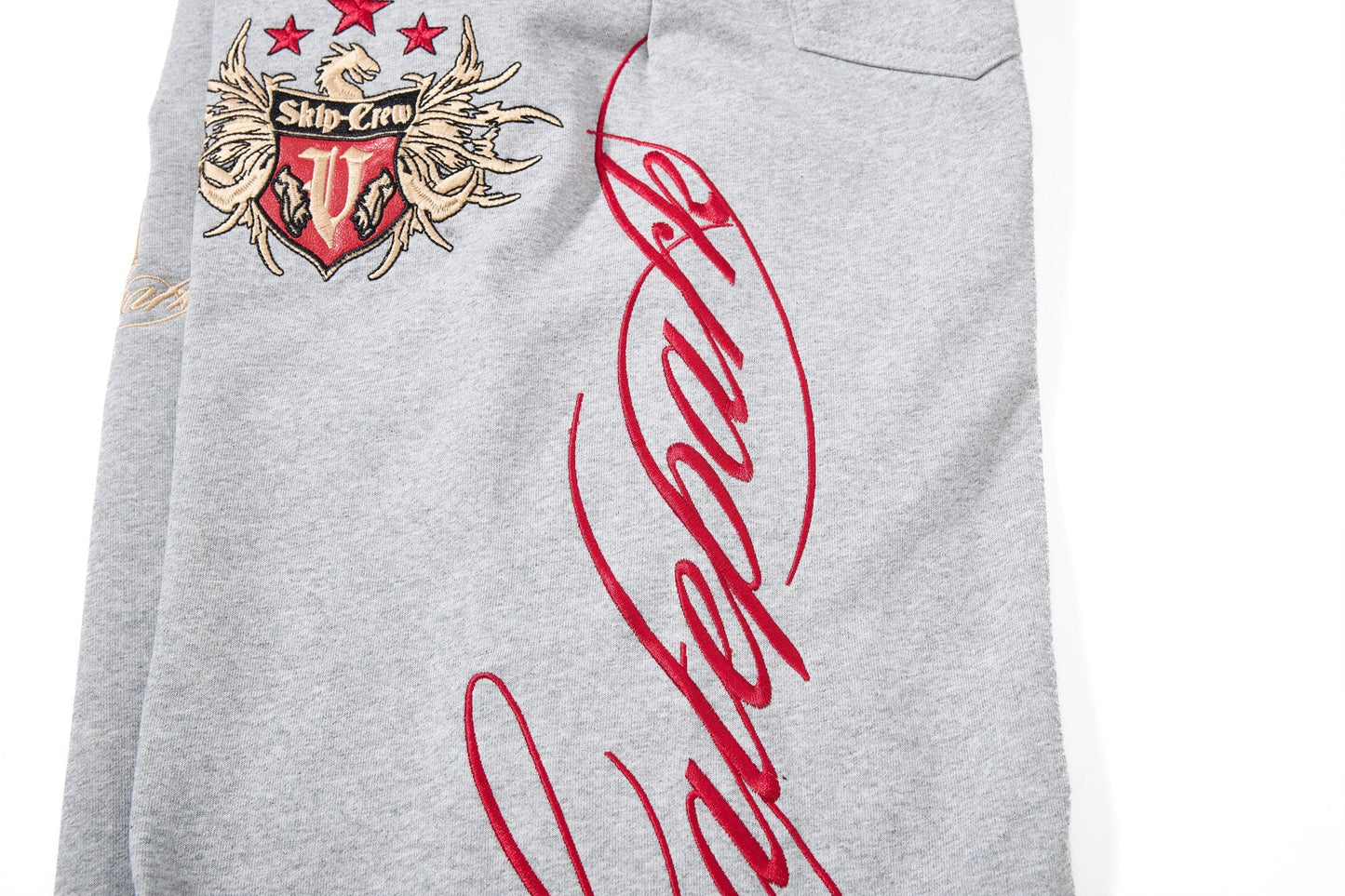 CapCabin “Varsity Crest Wide-Leg Sweatpants”