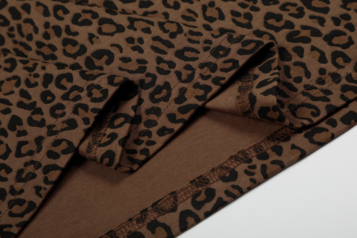 CapCabin “Leopard Script Polo Tee”