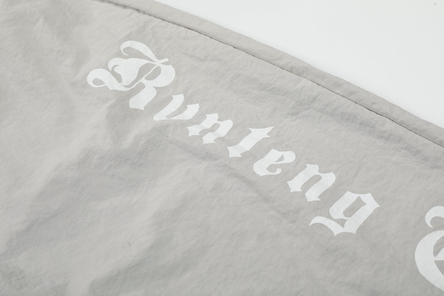 CapCabin Script Logo Wide-Leg Nylon Pants