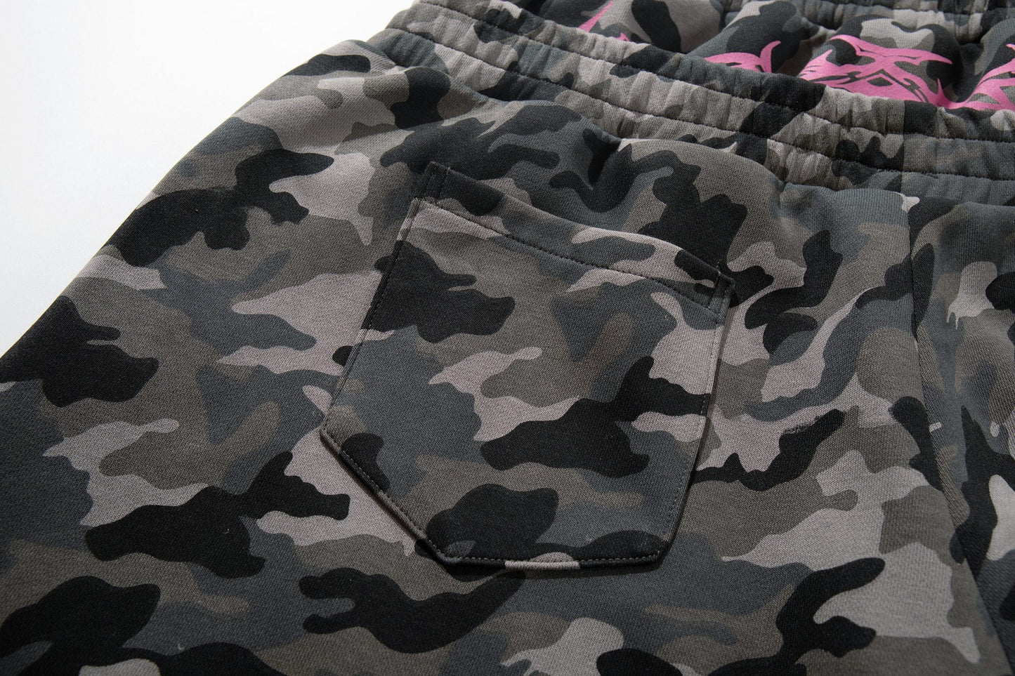 CapCabin “Camo Graffiti Wide-Leg Pants”