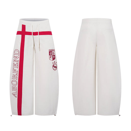 CapCabin Cross Graphic Wide-Leg Track Pants